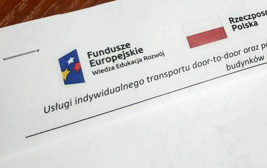 Zdjęcie urywku dokumentu z logiem Funduszu Europejskich i flagą Rzeczypospolitej Polskiej.